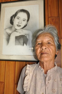 Dolores and her charcoal portrait during her younger years.