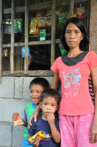 Lizl Ocuaman and her children  -beneficiaries of Pantawid Pamilya at Catuday, Bolinao, Pangasinan