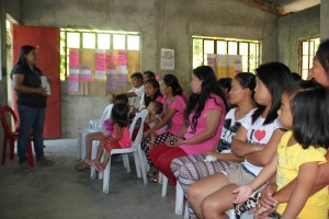 KALAHI CIDSS-NCDDP Community Empowerment Facilitator (CEF) Ronelia Bermudez facilitates the 2nd BA in Brgy. Mapisi, Nagukel, Ilocos Sur.