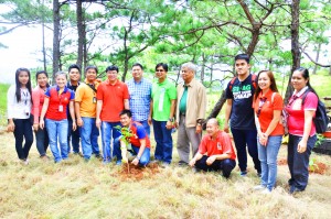 DSWD-FO1 Dir. Castillo, together with the DSWD employees from IN, joins the tree planting activity.