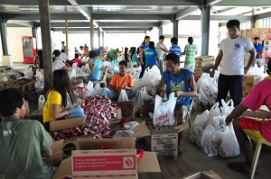 The family food packs repacking at DSWD satellite warehouse in Sta. Barbara, Pangasinan. 