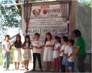 Students of Mabileg Primary School lead the invocation during the Turn-over ceremony of Barangay Mabilegs Water System sub-project