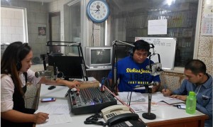 Project Development Officer III Wensley Sandi  (in the middle) discusses the Guidelines on  CSO Accreditation during DSWD FO1’s radio program aired at DZEA- Catholic Media Network, Laoag City with the Information Officers.
