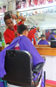 Manong Larry works at Jinrod Barber Shop (beside the market) in Bauang, La Union.